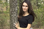 Ukrainian mail order bride Ekaterina from Nikolaev with brunette hair and green eye color - image 11