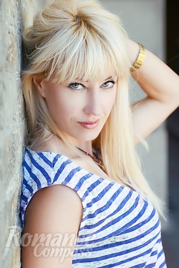 Ukrainian mail order bride Ella from Lugansk with blonde hair and blue eye color - image 1