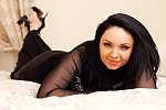 Ukrainian mail order bride Ruslana from Zdolbunov with black hair and green eye color - image 2