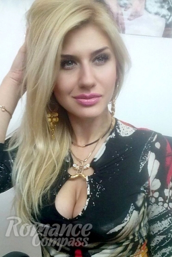 Ukrainian mail order bride Viktoriya from Lugansk with blonde hair and blue eye color - image 1