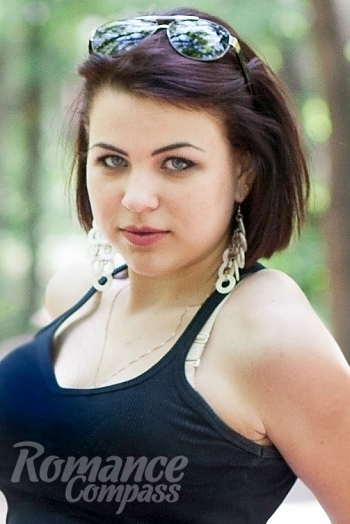 Ukrainian mail order bride Olga from Kharkov with black hair and green eye color - image 1