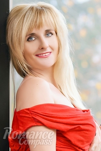 Ukrainian mail order bride Olga from Cherkassy with blonde hair and blue eye color - image 1