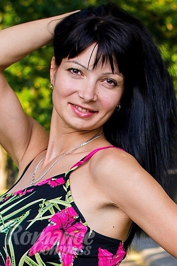 Ukrainian mail order bride Oksana from Nikolaev with black hair and brown eye color - image 1