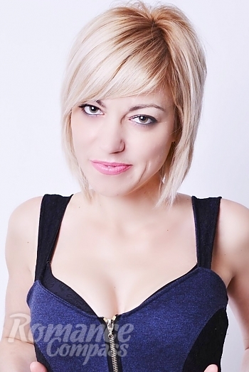 Ukrainian mail order bride Olga from Odessa with blonde hair and hazel eye color - image 1
