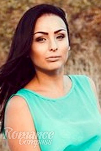 Ukrainian mail order bride Lidia from feodosia with brunette hair and blue eye color - image 1