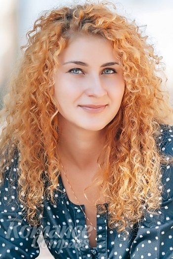 Ukrainian mail order bride Nina from Nikolaev with red hair and grey eye color - image 1