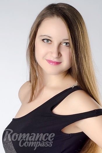 Ukrainian mail order bride Ulyana from Nikolaev with brunette hair and green eye color - image 1