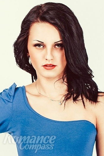 Ukrainian mail order bride Viktoria from Nilolaev with black hair and green eye color - image 1