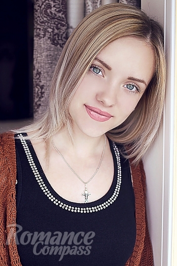 Ukrainian mail order bride Tatiana from Lugansk with blonde hair and blue eye color - image 1