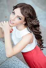 Ukrainian mail order bride Sveta from Brovary with light brown hair and green eye color - image 2