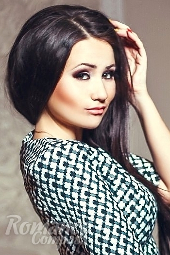 Ukrainian mail order bride Anastasia from Donetsk with black hair and green eye color - image 1