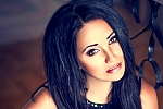 Ukrainian mail order bride Anastasia from Donetsk with black hair and green eye color - image 7