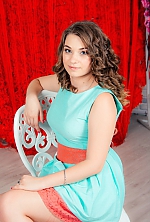 Ukrainian mail order bride Emilia from Melitopol with light brown hair and green eye color - image 9