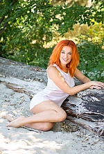 Ukrainian mail order bride Olga from Nikolaev with red hair and blue eye color - image 3