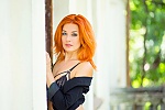 Ukrainian mail order bride Olga from Nikolaev with red hair and blue eye color - image 5