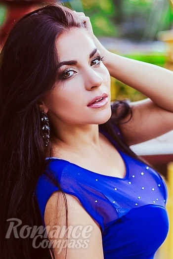 Ukrainian mail order bride Tatyana from Melitopol with black hair and green eye color - image 1