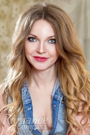 Ukrainian mail order bride Angela from Odessa with auburn hair and blue eye color - image 1