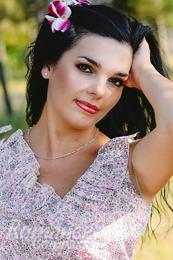 Ukrainian mail order bride Oksana from Nikolaev with black hair and brown eye color - image 1