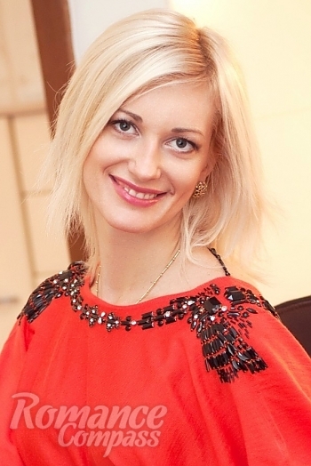 Ukrainian mail order bride Tatyana from Kherson with blonde hair and blue eye color - image 1