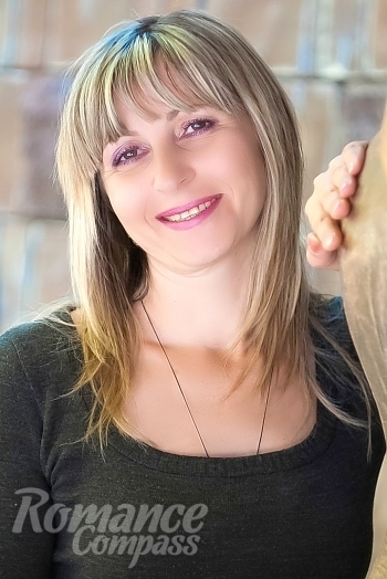 Ukrainian mail order bride Anna from Nikolaev with white grey hair and black eye color - image 1