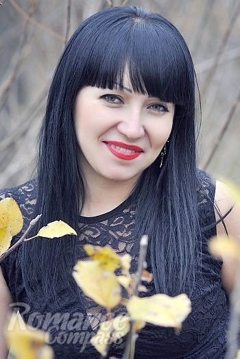 Ukrainian mail order bride Anna from Nikolaev with black hair and brown eye color - image 1