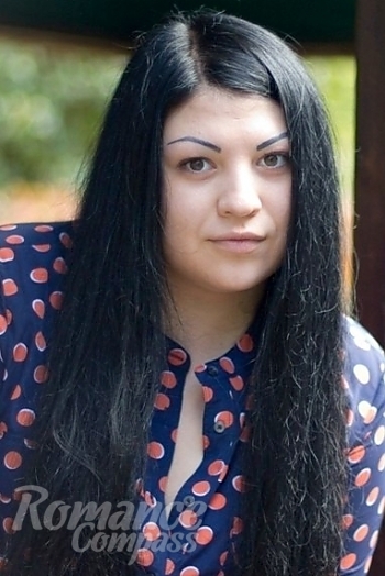 Ukrainian mail order bride Yana from Nikolaev with black hair and brown eye color - image 1