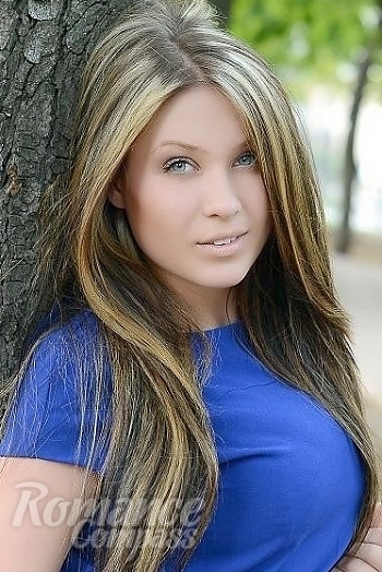 Ukrainian mail order bride Olesya from Lvov with blonde hair and blue eye color - image 1