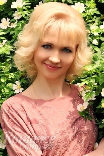 Ukrainian mail order bride Juliya from Nikolaev with blonde hair and blue eye color - image 1