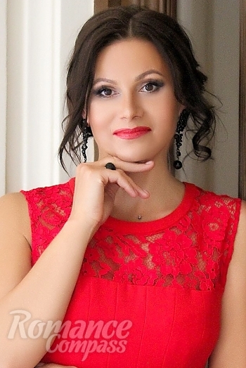 Ukrainian mail order bride Inga from Odessa with black hair and brown eye color - image 1
