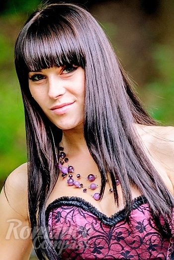 Ukrainian mail order bride Olga from Vinnitsa with black hair and green eye color - image 1