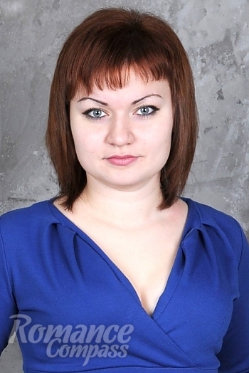Ukrainian mail order bride Oksana from Dnipro with brunette hair and black eye color - image 1