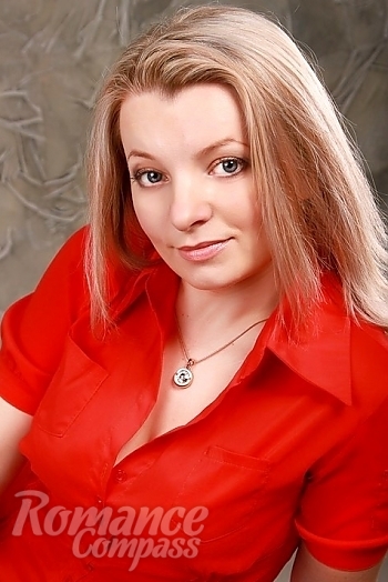 Ukrainian mail order bride Alena from Kiev with blonde hair and blue eye color - image 1