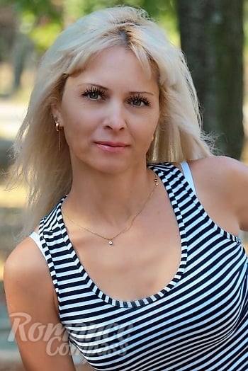 Ukrainian mail order bride Tatiana from Kherson with blonde hair and green eye color - image 1