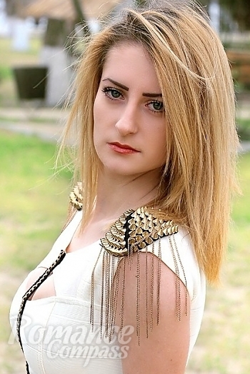 Ukrainian mail order bride Irina from Kherson with blonde hair and green eye color - image 1