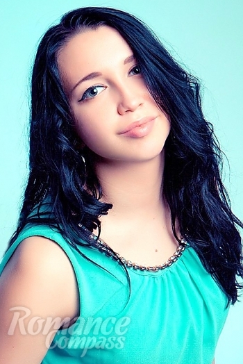 Ukrainian mail order bride Marina from Kiev with black hair and green eye color - image 1