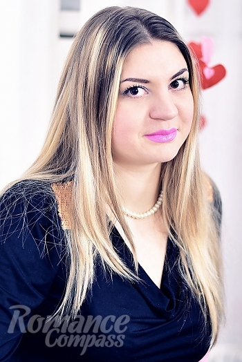Ukrainian mail order bride Marina from Nikolayev with light brown hair and hazel eye color - image 1