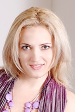 Ukrainian mail order bride Anna from Nikolaev with blonde hair and green eye color - image 3