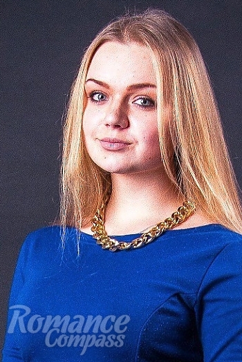 Ukrainian mail order bride Mariya from Kiev with blonde hair and blue eye color - image 1