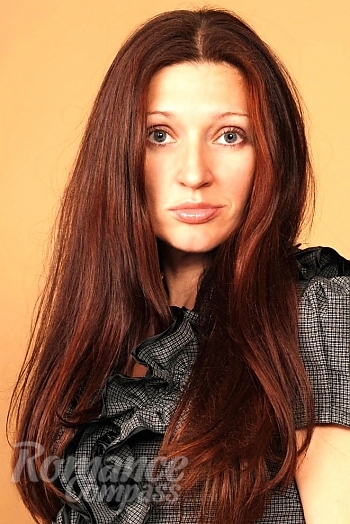 Ukrainian mail order bride Lyudmila from Kharkov with red hair and grey eye color - image 1