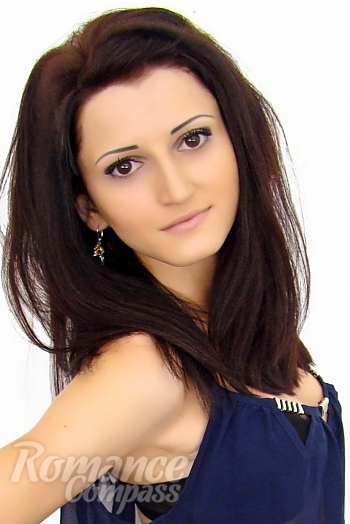 Ukrainian mail order bride Irina from Kharkov with black hair and hazel eye color - image 1