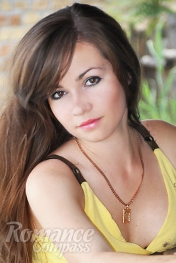 Ukrainian mail order bride Yana from Sumy with brunette hair and hazel eye color - image 1