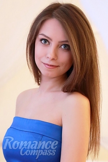 Ukrainian mail order bride Irina from Melitopol with light brown hair and blue eye color - image 1