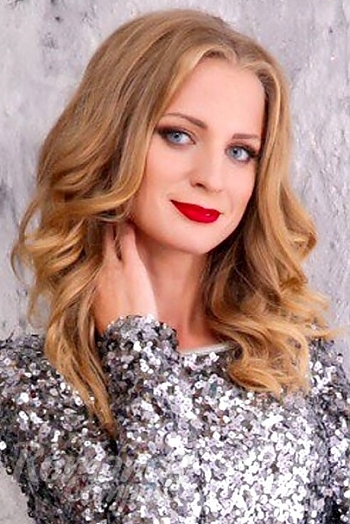 Ukrainian mail order bride Natali from Odessa with blonde hair and blue eye color - image 1