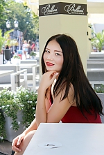 Ukrainian mail order bride Alexandra from Odessa with black hair and hazel eye color - image 5