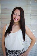 Ukrainian mail order bride Liana from Odessa with black hair and green eye color - image 3
