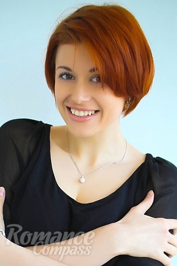 Ukrainian mail order bride Diana from Odessa with red hair and hazel eye color - image 1