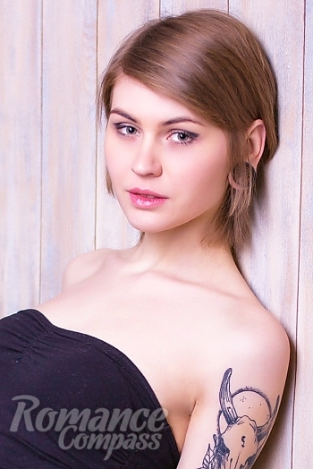 Ukrainian mail order bride Olga from Nikolaev with light brown hair and green eye color - image 1