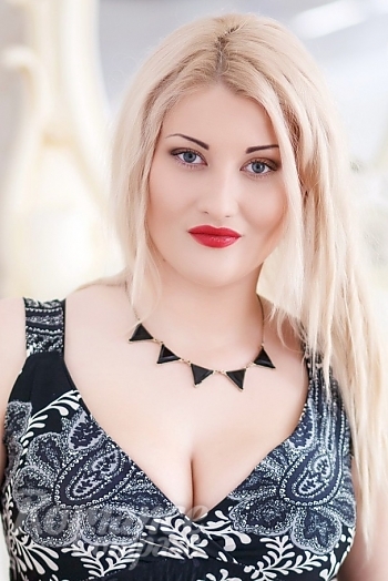 Ukrainian mail order bride Nadia from Kiev with blonde hair and blue eye color - image 1