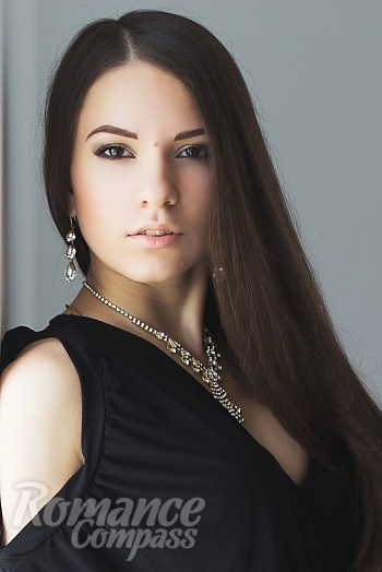 Ukrainian mail order bride Oksana from Lugansk with light brown hair and brown eye color - image 1