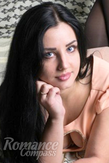 Ukrainian mail order bride Yulia from Donetsk with black hair and blue eye color - image 1